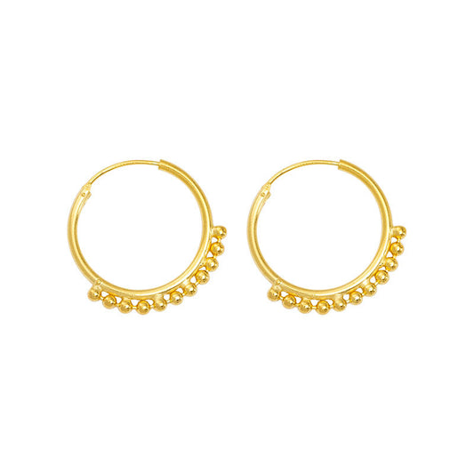 What are hoop earrings and why are they popular?